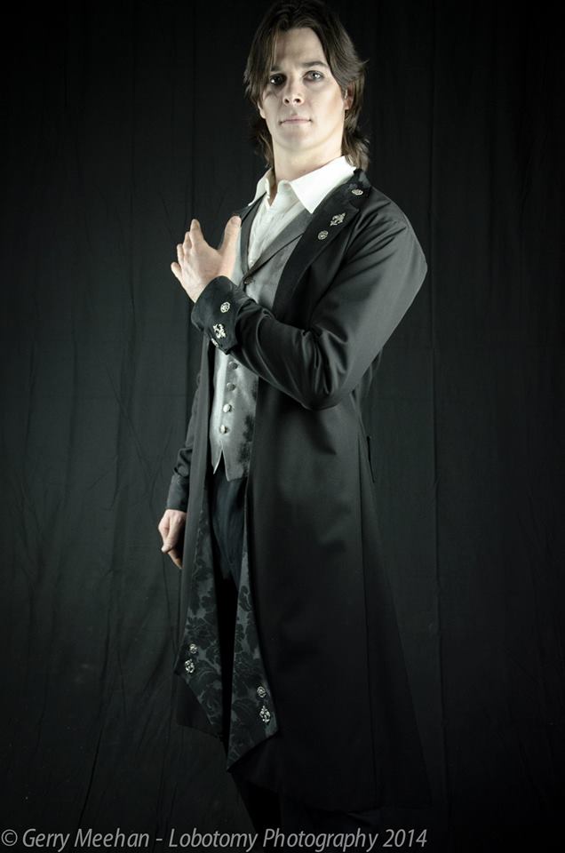 Black brocade and wool gothic Victorian coat