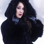 Black coat with fur trim and beaded navy lace