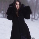 Black coat with fur trim and beaded navy lace